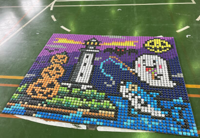 千葉県内の特別支援学校にてペットボトルキャップアートを制作するワークショップを開催しました